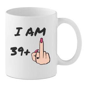 40th Birthday Her White mug with the text “I Am 39+” and a cartoon female hand with red nails showing a middle finger.