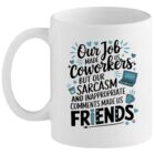 White ceramic mug with blue and black typography reading “Our Job Made Us Coworkers but Our Sarcasm and Inappropriate Comments Made Us Friends”, featuring small doodles of hearts, a laptop, and a coffee cup.